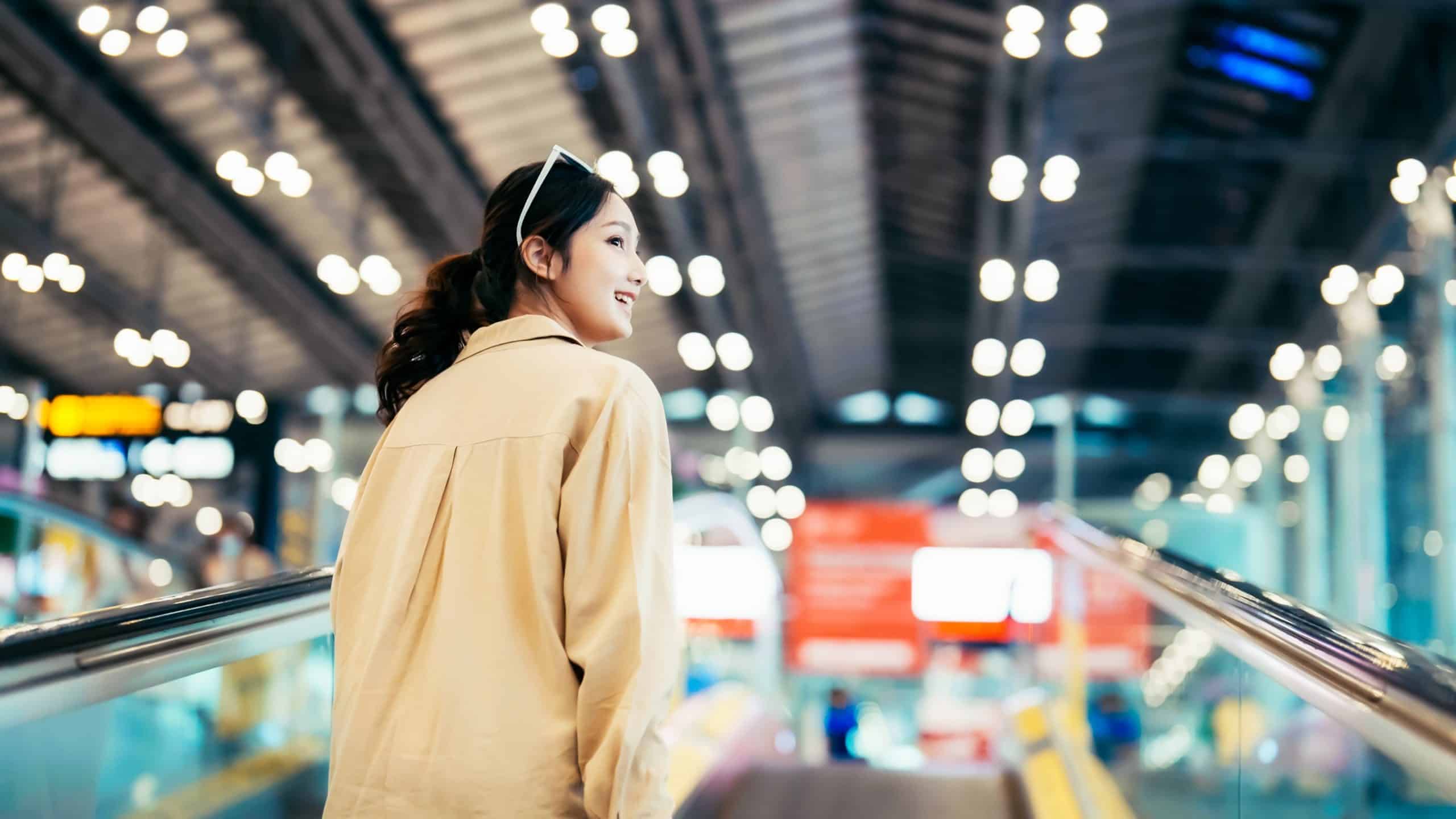 person using public transportation living a car free life