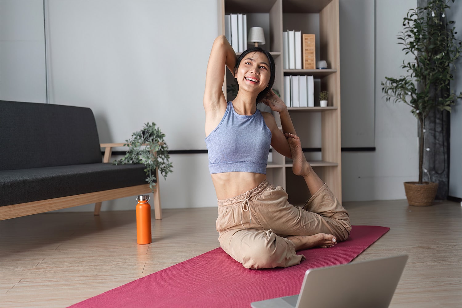 woman doing yoga at home